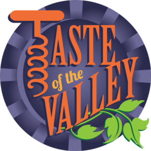 Taste of the valley logo in orange color on purple background
